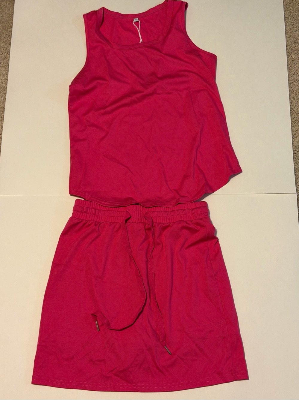 Set Pink Activewear set
Size XS NWT
Skirt has built-in shorts Gym